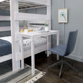 White twin bunk bed with built-in desk and blue swivel chair in a modern kids' bedroom — space-saving study nook with polka-dot bedding, pencil cup, potted plant and framed flower art