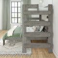 Gray wooden bunk bed with green bedding and patterned pillows in a modern bedroom with large grid window and sage curtains