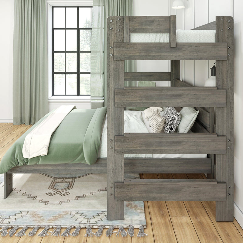 Rustic gray wooden bunk bed with sage green bedding and curtains in a bright modern farmhouse bedroom by a large window