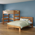 Solid wood bunk beds in a modern kids' bedroom with blue walls, light green bedding and hardwood floors
