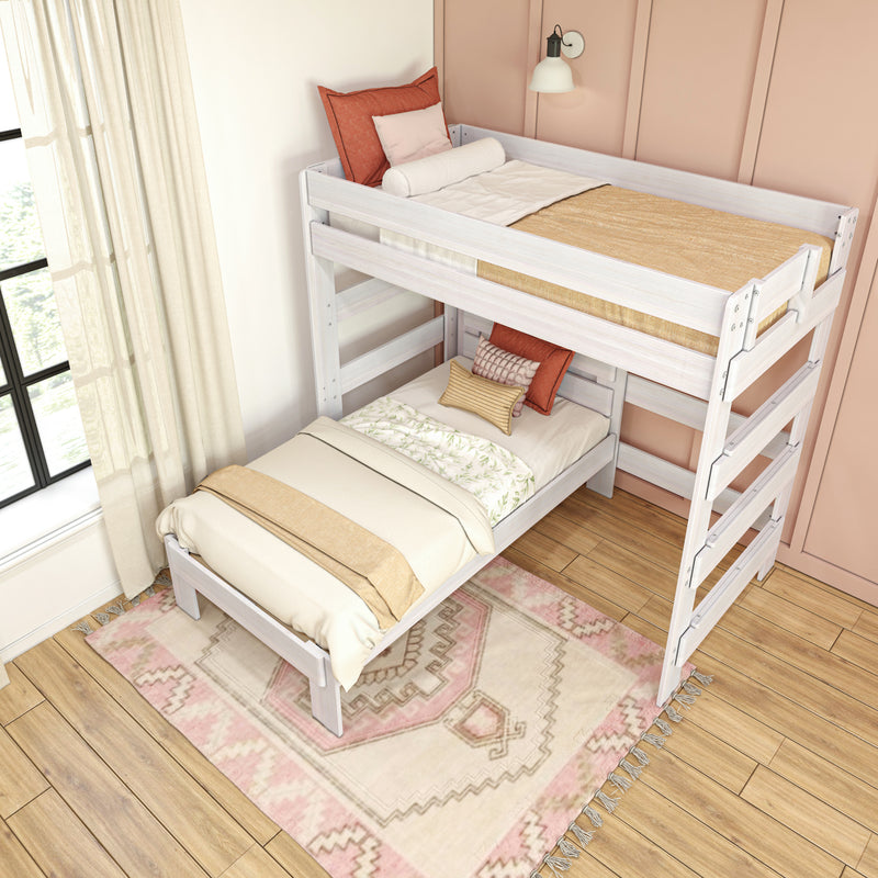 White wooden twin bunk bed with neutral linens, rust and blush throw pillows, cozy boho rug and sheer curtains against a peach accent wall in a bright modern kids' bedroom