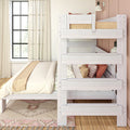 Whitewashed wooden bunk bed with full-size lower bed and twin upper bed in a bright bohemian bedroom featuring neutral linen bedding, textured throws and pillows, patterned area rug, hardwood floors, large window with sheer curtains and wall-mounted lamp