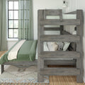 Rustic gray wooden bunk bed with sage green bedding and patterned pillows in a bright modern farmhouse bedroom by a window with green curtains