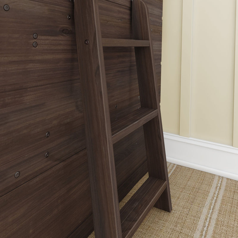 Wooden loft ladder against a dark wooden paneled wall with beige carpet and wainscoting.