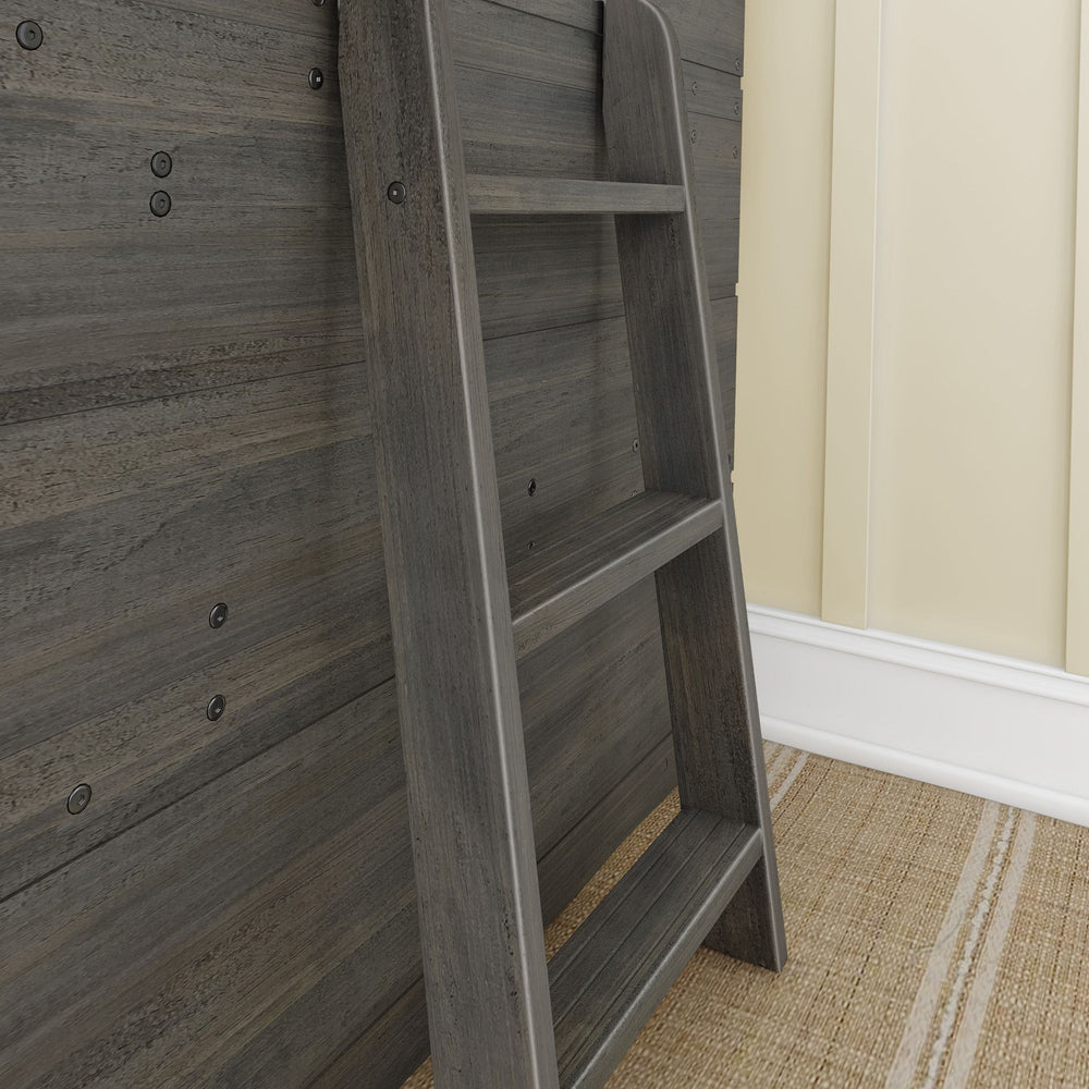 Rustic wooden ladder leaning against a wooden wall in a cozy home interior.