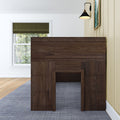 Dark wood headboard in modern farmhouse bedroom interior with oak hardwood floor and blue area rug, window with olive green Roman shade, black wall sconce and framed nature artwork on beige vertical shiplap wall