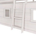 Whitewashed wooden loft bed ladder close-up showing light wood bunk bed frame with small window panels