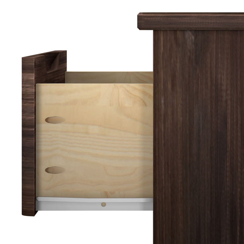 Open wooden drawer on dark wood dresser, close-up view showing interior details.