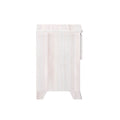 Side view of whitewashed wood bedside table nightstand with tapered legs and single drawer in modern farmhouse style