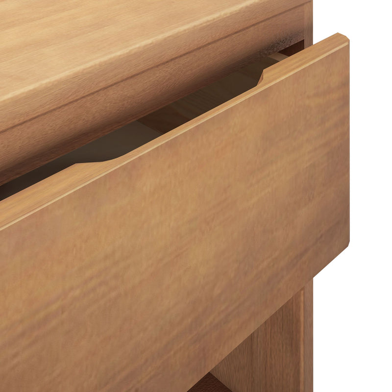 Close-up of natural oak dresser drawer with recessed finger-pull and visible wood grain — modern wooden bedroom storage cabinet detail