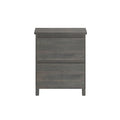 Gray wood two-drawer nightstand bedside table with short legs, modern rustic bedroom storage cabinet isolated on white background