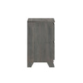 Side view of gray wood three-drawer dresser with tapered legs — modern bedroom storage furniture on white background