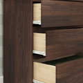 Dark wood bedroom dresser with open drawers revealing light wood interiors and metal drawer slides, modern storage solution