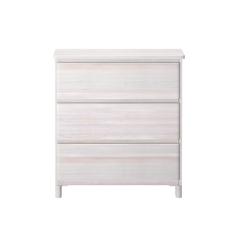 White wooden three-drawer dresser for bedroom storage.