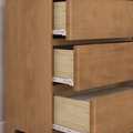 Modern wooden dresser with three partially open drawers, light wood finish and visible metal drawer slides for bedroom storage