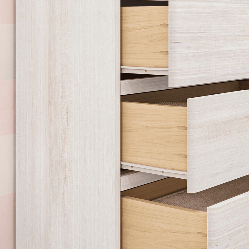 Scandinavian whitewashed dresser with open light-wood drawers showing minimalist bedroom storage and natural wood grain