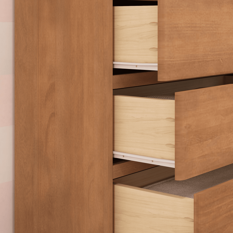 Open wooden dresser drawers showcasing interior storage space.