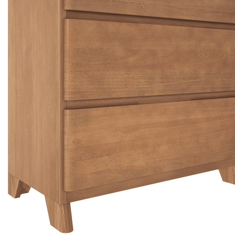 Close-up of a mid-century modern wooden dresser with two smooth front drawers, natural oak finish and tapered legs