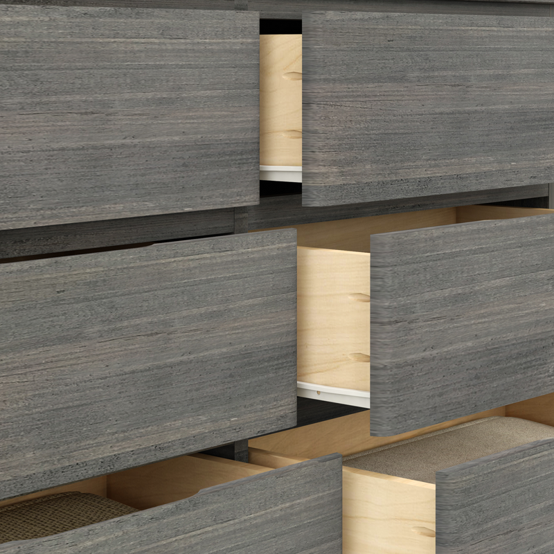 Open wooden dresser drawers showcasing modern cabinetry design in dark finish.
