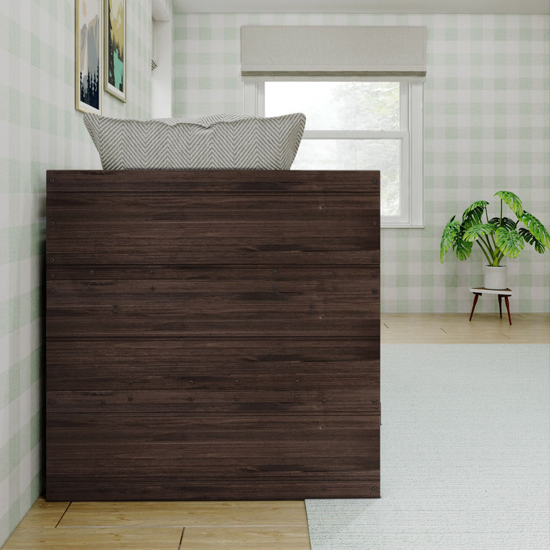 Stylish modern bedroom with dark wooden bed, patterned cushion, plant decor, and scenic wall art.