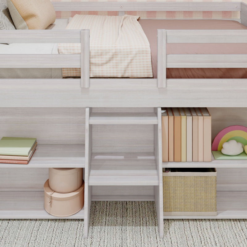 Loft bed with storage shelves, ladder access, and cozy checkered bedding in a children's room.