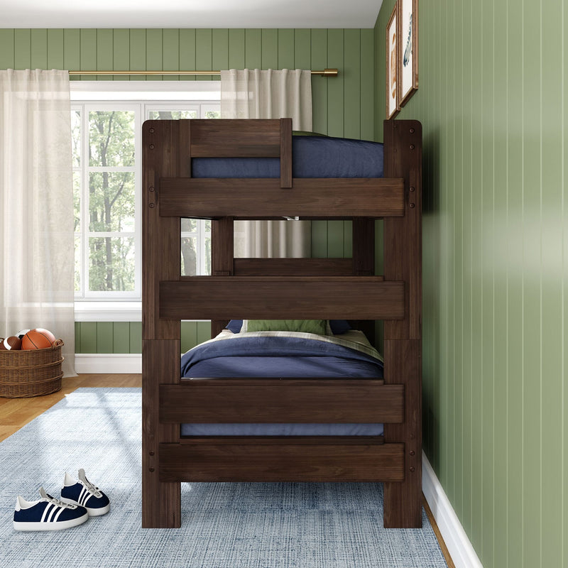 Dark wood bunk bed with blue bedding in bright kids bedroom, green vertical paneled wall, window with sheer curtains and wicker basket of sports balls