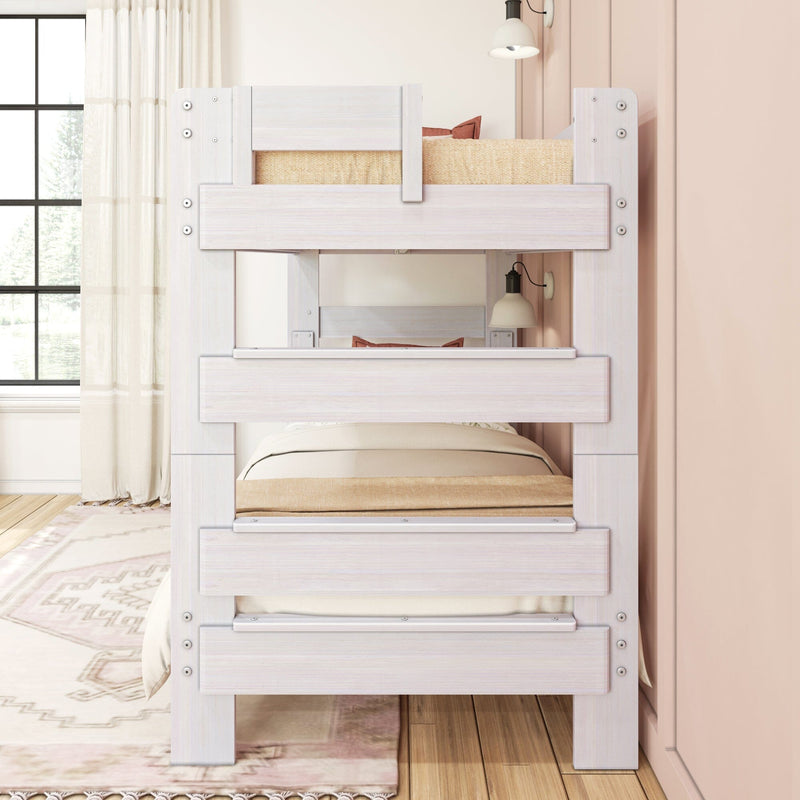 Wooden triple bunk bed in a cozy, light-filled bedroom with pink accents.