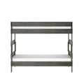 Gray weathered wood loft bunk bed frame with integrated ladder and white mattress, modern farmhouse style