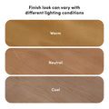 Wood flooring finish samples with rounded swatches labeled Warm, Neutral, Cool under heading "Finish look can vary with different lighting conditions," illustrating how lighting affects wood color