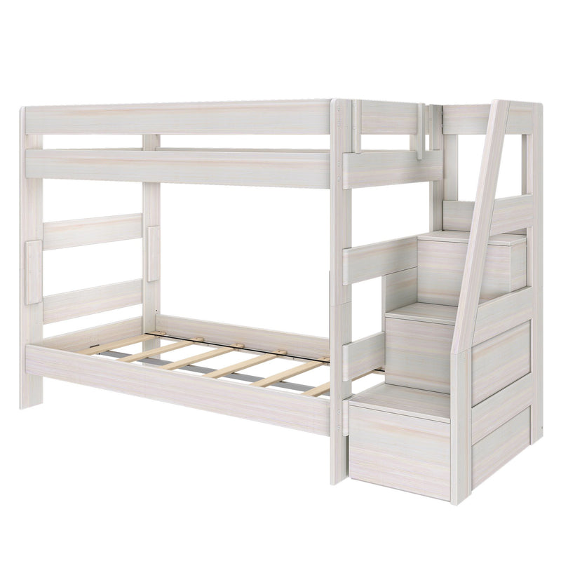 Whitewashed wooden twin-over-twin bunk bed with built-in storage stairs, slatted mattress bases, and modern space-saving design for kids' bedrooms
