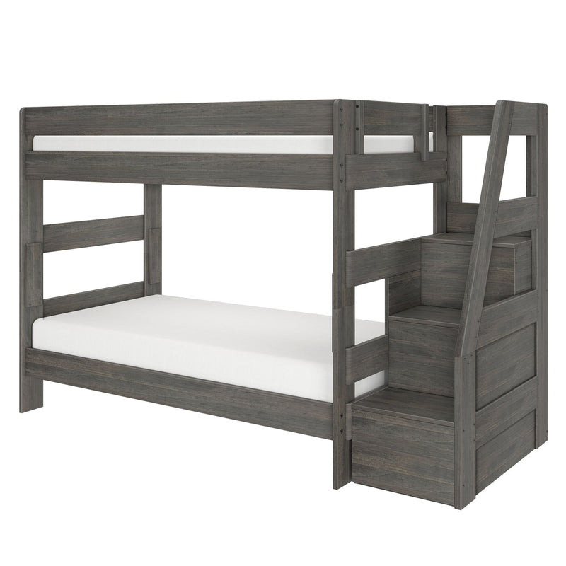 Gray wood twin-over-full bunk bed with built-in staircase storage, guardrails and white mattresses for space-saving kids' bedroom furniture