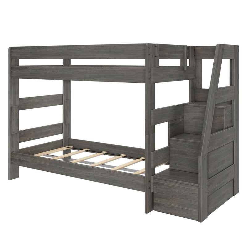 Gray wooden twin-over-full bunk bed with ladder, built-in storage stairs, guardrails and slatted mattress support, space-saving kids bedroom furniture in modern rustic finish