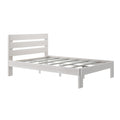White wooden platform bed frame with slatted headboard and metal support slats