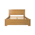 Light oak wooden platform bed frame with slatted base and paneled headboard