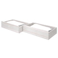 Pair of white wood under-bed pull-out trundle storage drawers on casters with bedding — space-saving bedroom organizer for twin beds