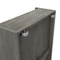 Sliding barn door hardware: gray weathered wood panel with two metal roller wheels and mounting brackets for sliding door track