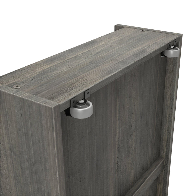 Sliding barn door hardware: gray weathered wood panel with two metal roller wheels and mounting brackets for sliding door track