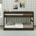Twin-over-full dark wood bunk bed in a children's bedroom with green plaid wallpaper, neutral bedding and pillows, framed mountain wall art, hardwood floor and light area rug