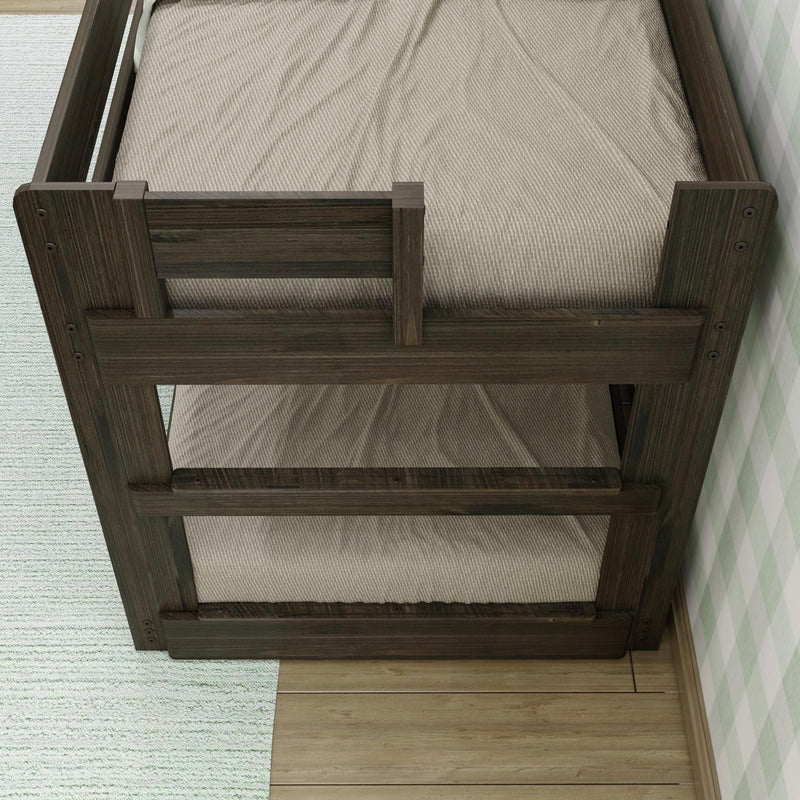 Dark wood bunk bed with beige bedding on a wooden floor next to a light blue rug.