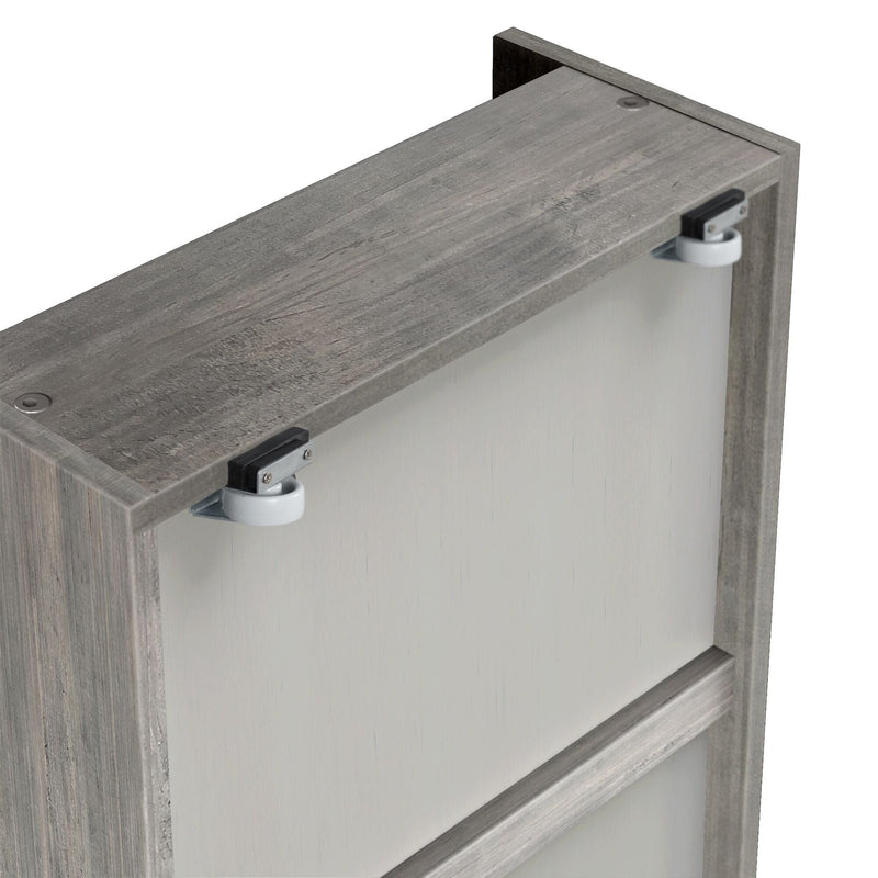 Close-up of gray wood sliding barn door hardware with white nylon rollers and weathered oak finish, ideal modern farmhouse closet or cabinet door hardware