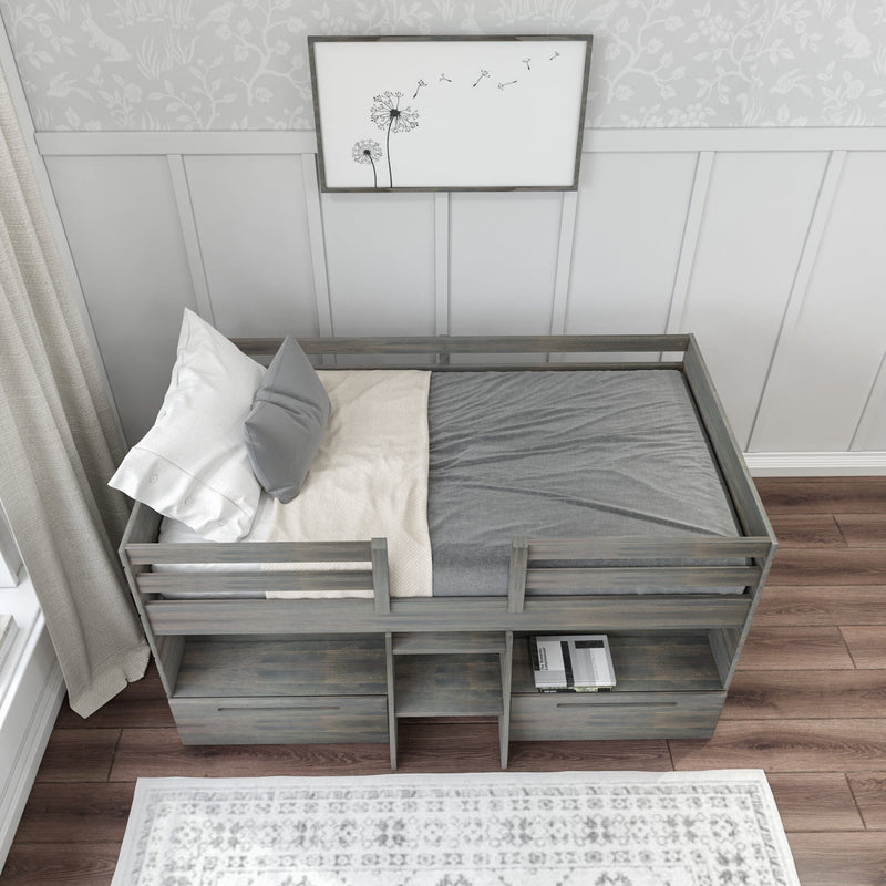 Gray daybed with storage drawers in a modern bedroom featuring white panel walls and wood flooring.