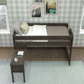 Dark wood twin loft bed with built-in desk, green buffalo check wallpaper, cozy pillows and framed nature prints in modern farmhouse bedroom