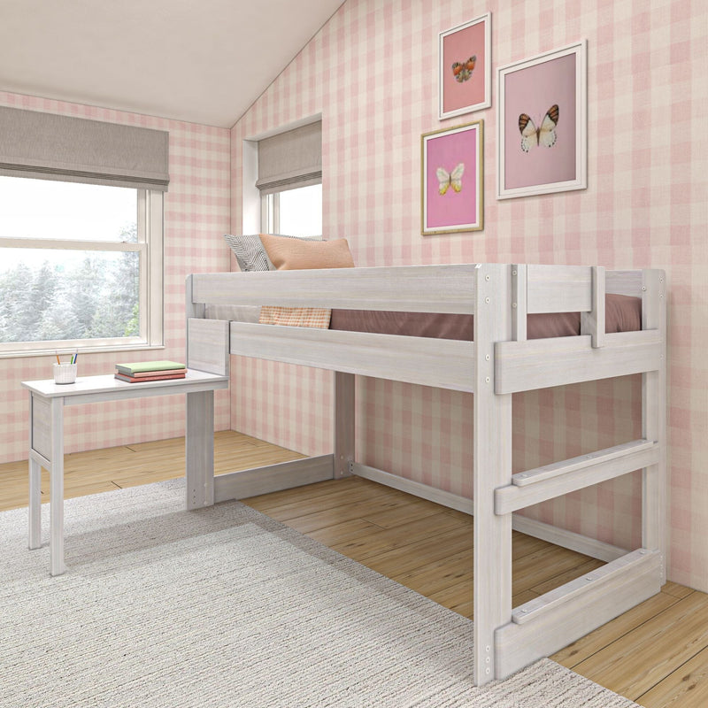 Wooden loft bed with built-in desk in a pink plaid-patterned children's bedroom.