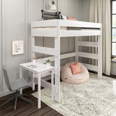 White wooden loft bed with built-in study desk and ladder over cozy bean bag reading nook, gray swivel chair and patterned rug in a minimalist kids bedroom