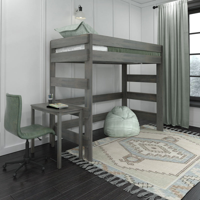Gray wooden loft bed with built-in study desk, mint green pillow and bean bag, patterned rug and curtains in a modern kids' bedroom