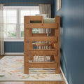 Loft-style wooden bunk bed with built-in study desk and chair in a kids' bedroom with blue paneled wall, large window, and floral area rug