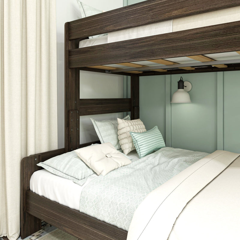 Dark walnut bunk bed with mint green bedding, textured cream curtains and white wall sconce in a modern bedroom