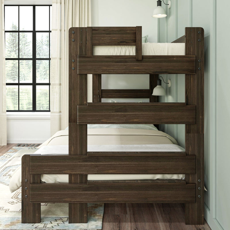 Solid dark wood twin-over-twin bunk bed with guardrails and wall sconce in a modern farmhouse kids' bedroom by a large grid window