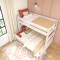 White wooden twin-over-full bunk bed in pink bedroom with cozy boho bedding, ladder, patterned rug and sunlit window