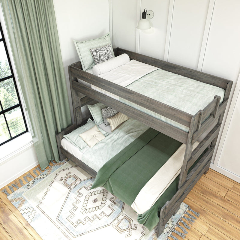 Rustic wood bunk bed with green and white bedding in a modern bedroom featuring a geometric area rug and natural light from a large window.